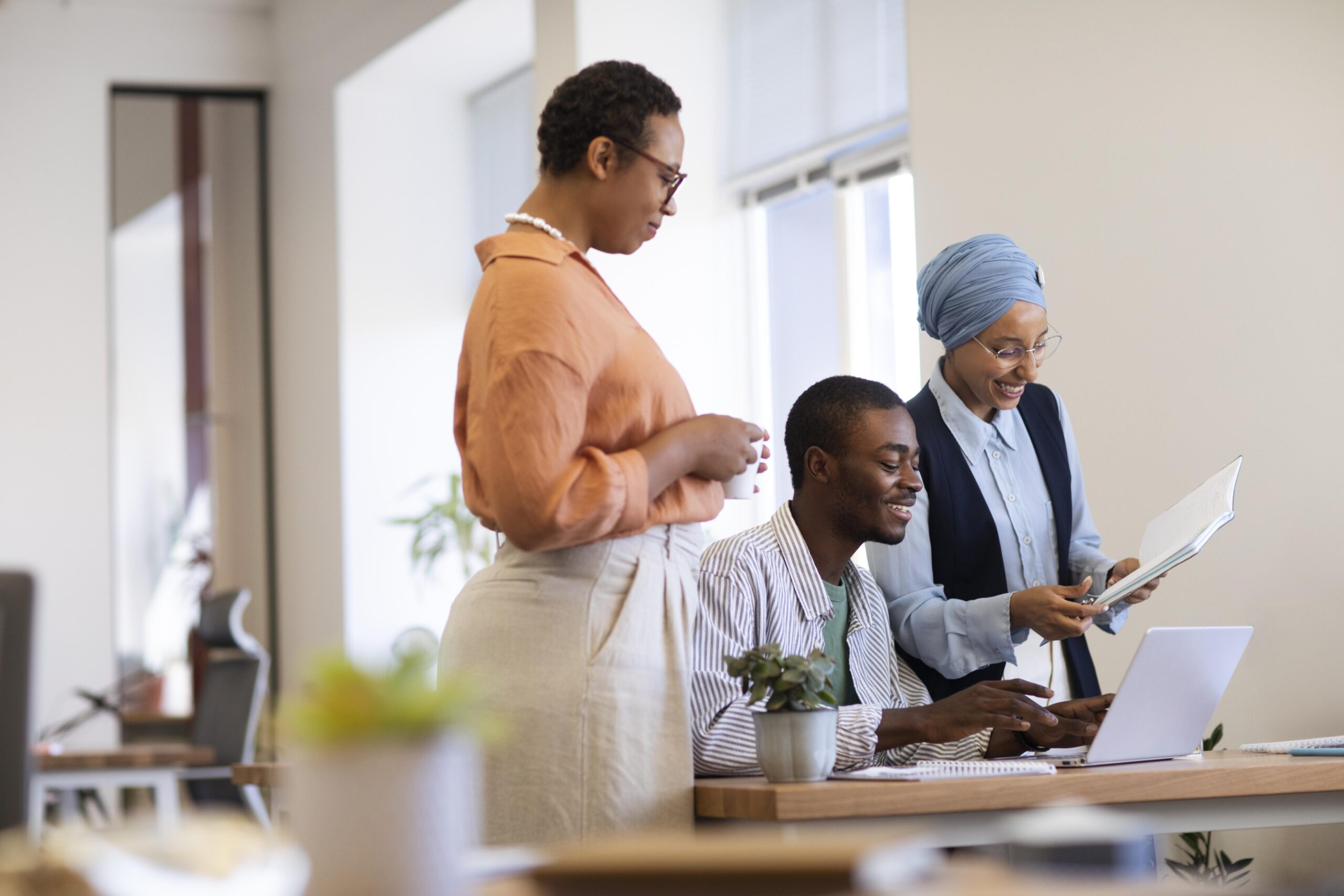 Male Employee Getting Used His New Office Job Along With Female Colleagues Scaled