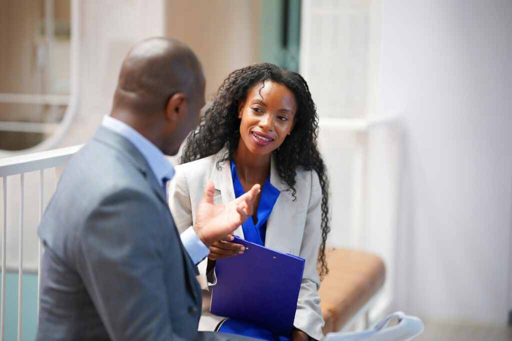 hispanic and confidence afro business woman in workspace, working at startup modern office.